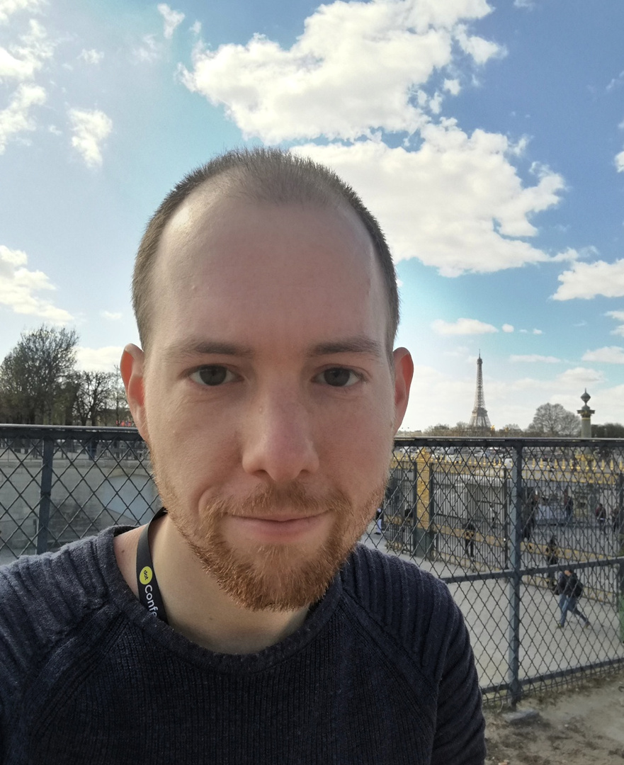 Me in Paris visiting dotGo in 2019. You can just make out the Eiffel Tower in the background.